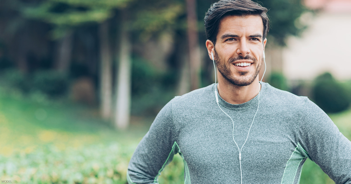 Man jogging after post weight loss surgery in St. Louis, MO.